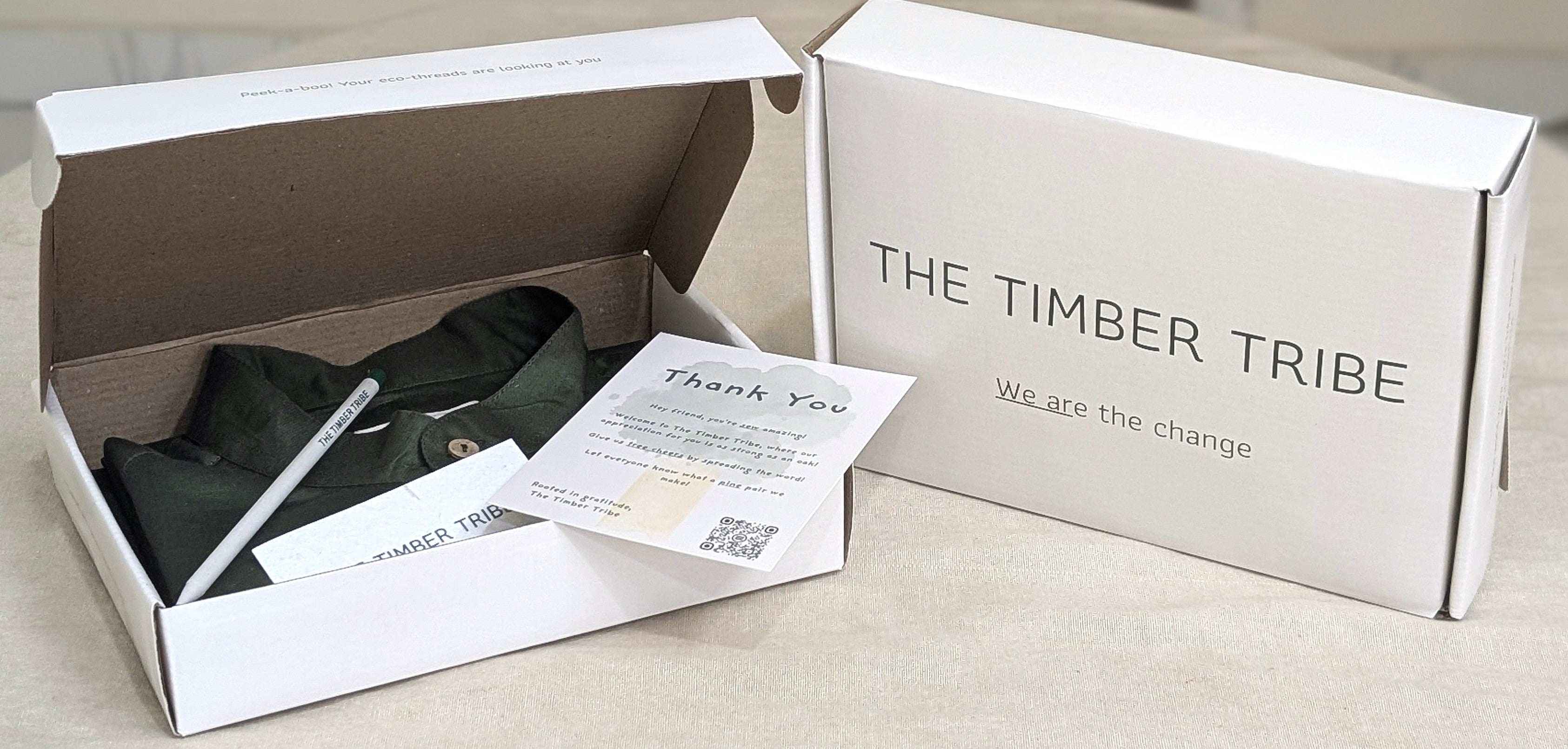 The Timber Tribe's sustainable packaging with plantable seed paper hang tag and seed pencil