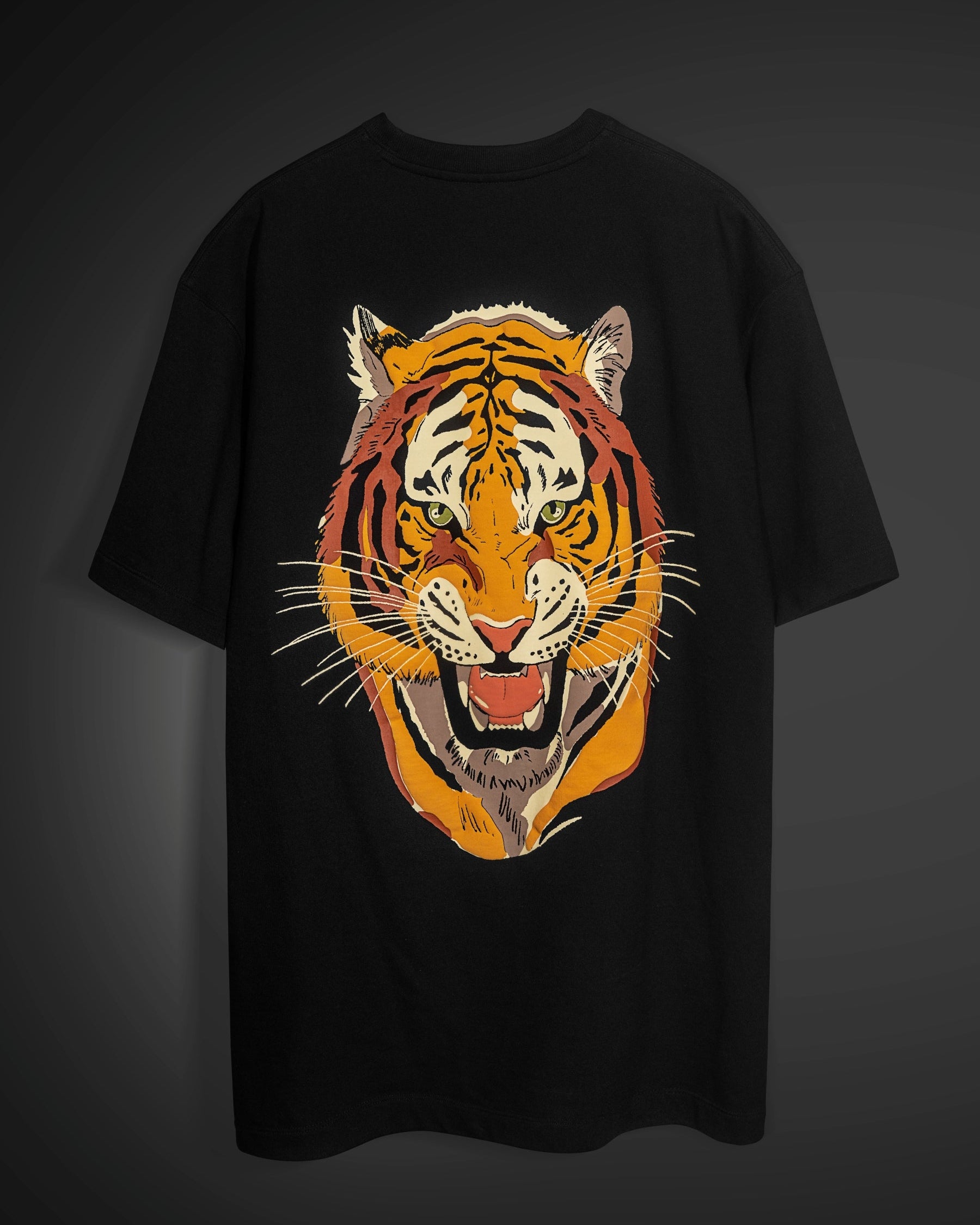 Black t-shirt with a tiger graphic on a dark background